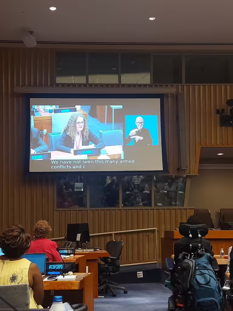 Marit Sørheim speaking to the audience at the CSF-CRPD